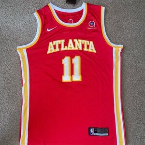 Trae Young ATLANTA HAWKS Nike Red and Yellow Atlanta Basketball Jersey
